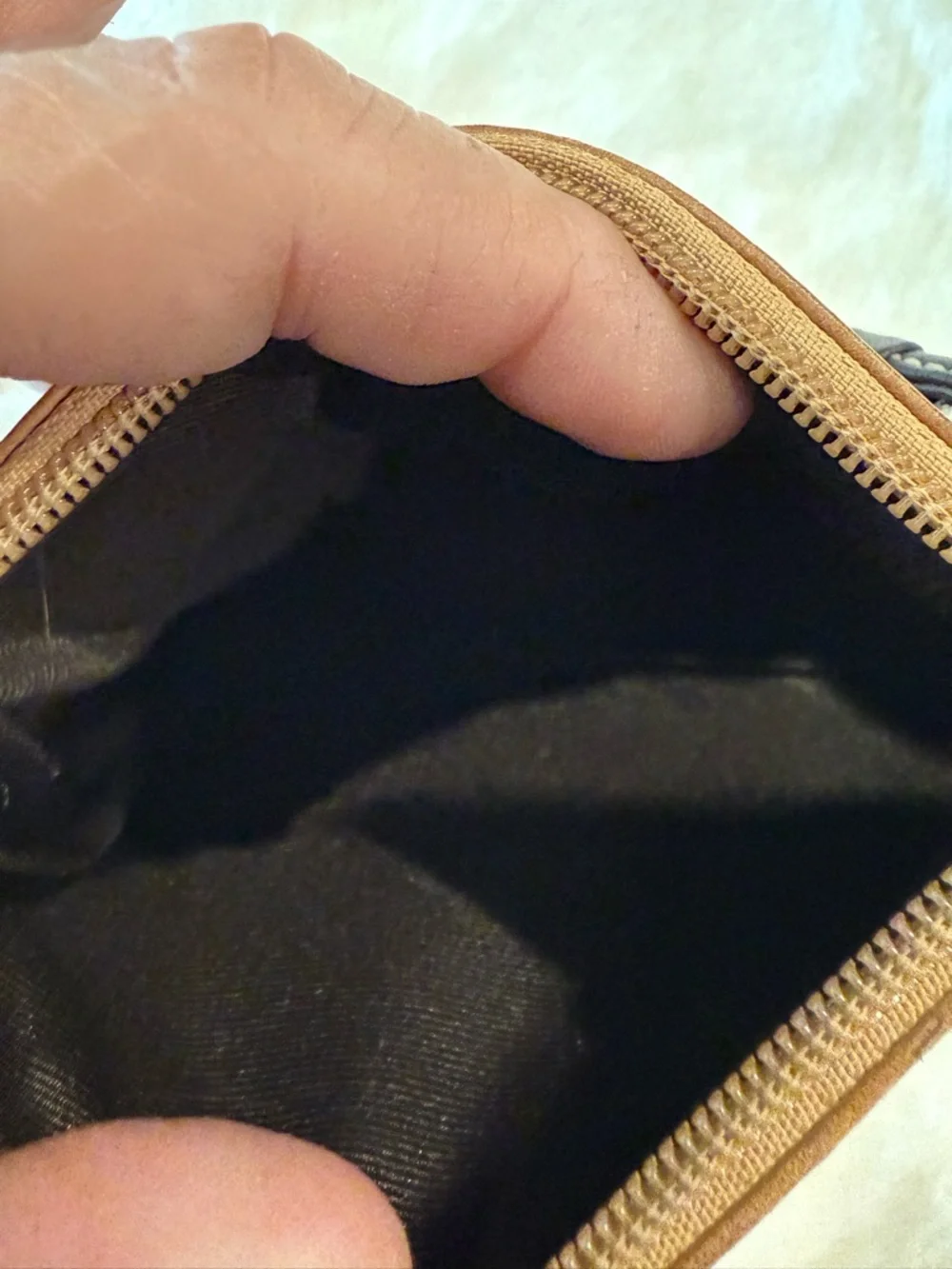 Coach Tan Leather Wristlet with Black Strap , It's staine in some places